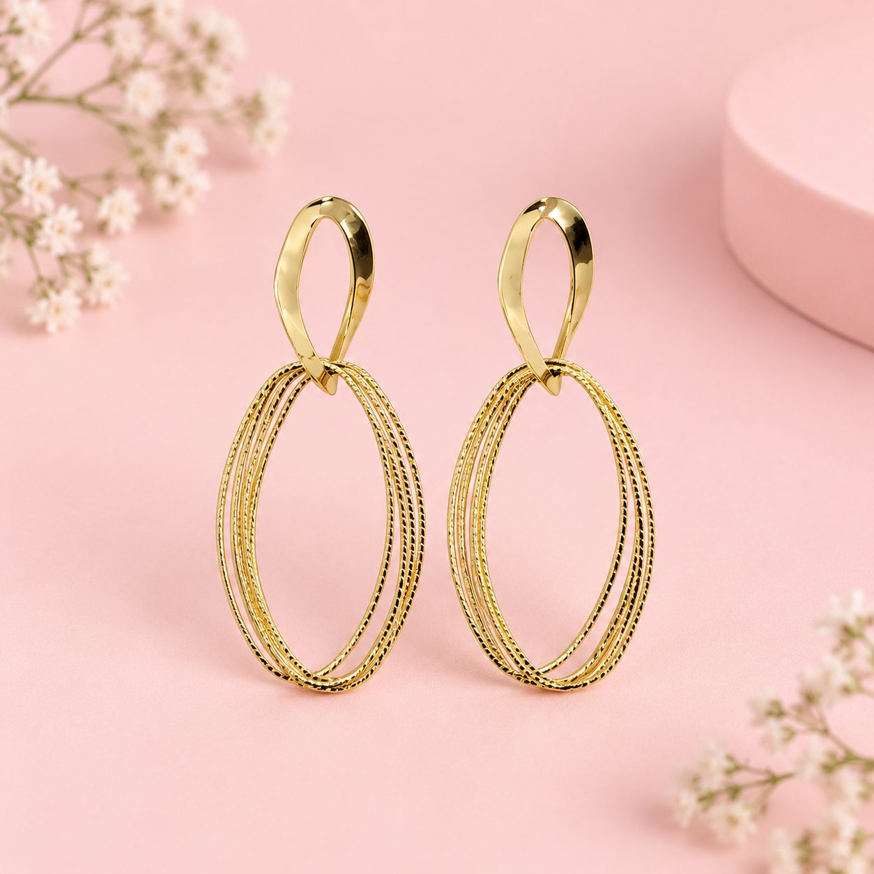 Aretes Serena · Cobre enchapado en oro de 18k