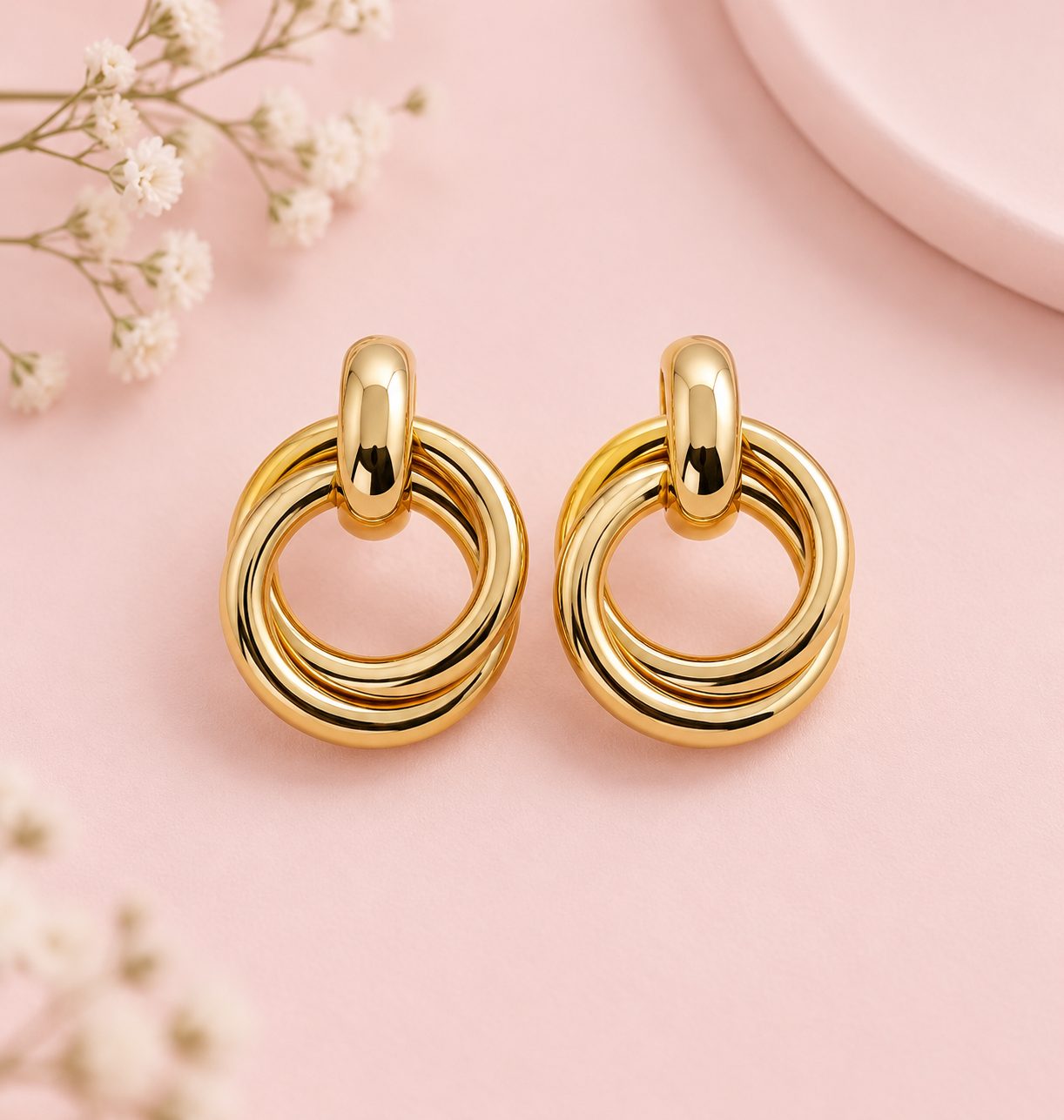 Aretes Amara · Cobre enchapado en oro de 18k