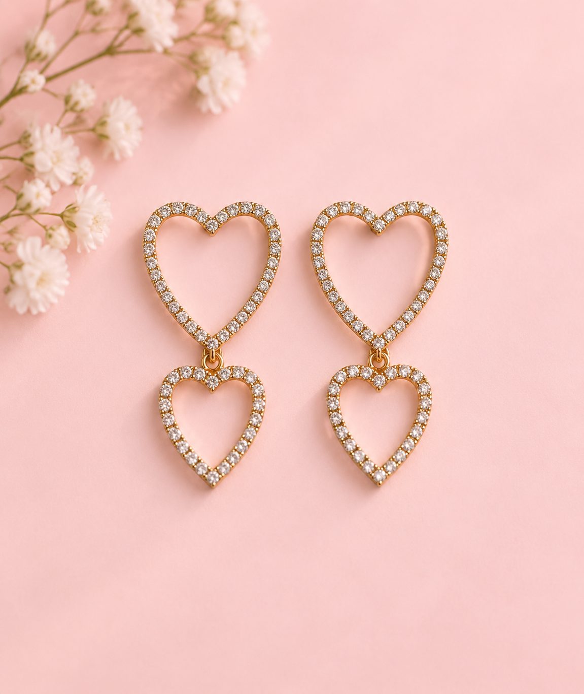 Aretes Double Love · Cobre enchapado en oro de 18k 